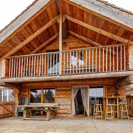 Naturstammhaus Almhuette